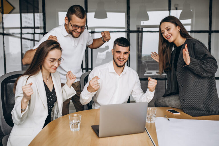 Group of people working out business plan in an office